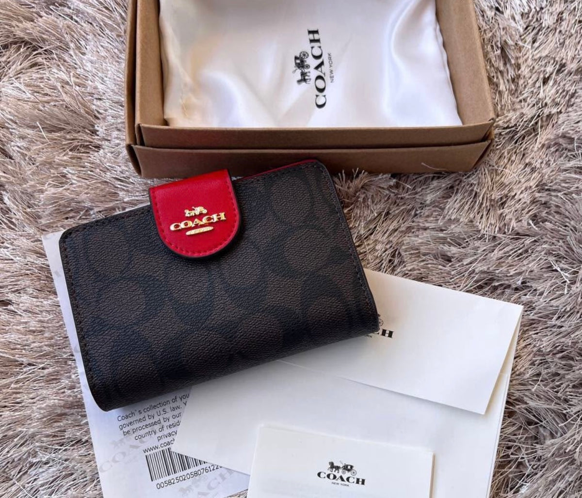 MEDIUM CORNER ZIP WALLET IN SIGNATURE CANVAS