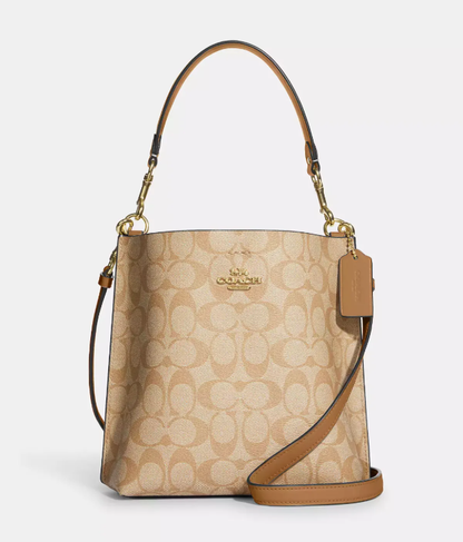 COACH MOLLIE BUCKET BAG IN SIGNATURE CANVAS