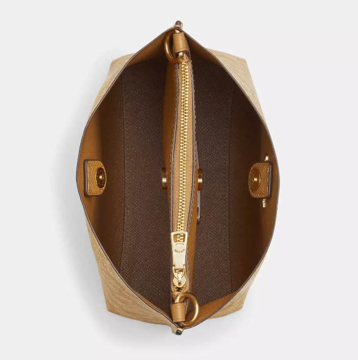 COACH MOLLIE BUCKET BAG IN SIGNATURE CANVAS