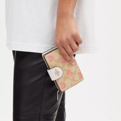 Medium Corner Zip Wallet In Signature Canvas With Heart