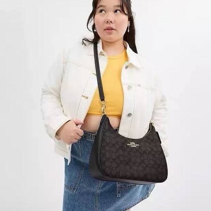 TERI HOBO BAG IN SIGNATURE CANVAS