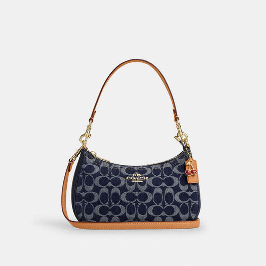 Teri Shoulder Bag
In Signature Denim