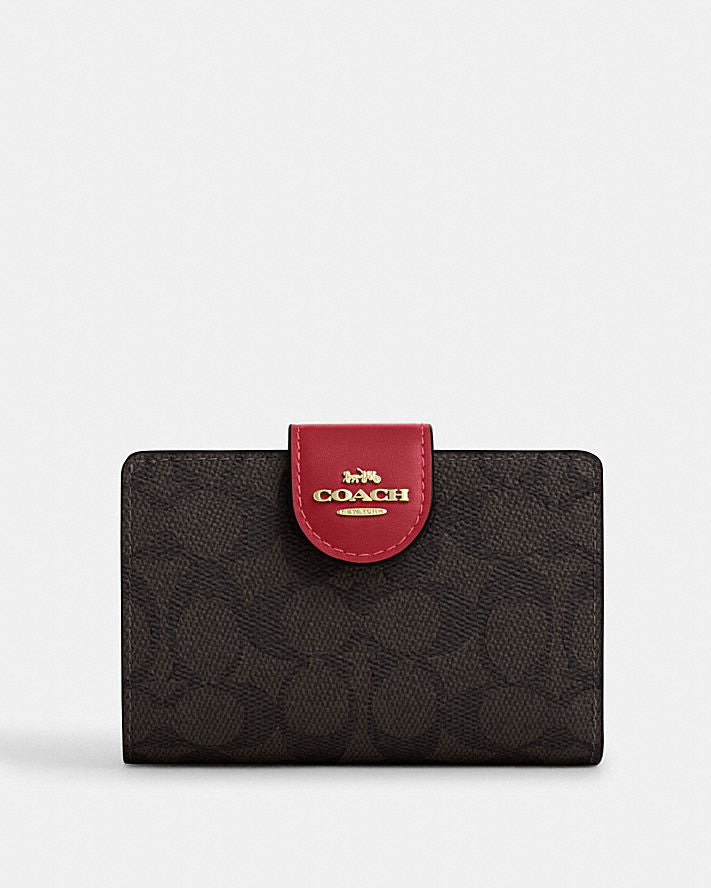 MEDIUM CORNER ZIP WALLET IN SIGNATURE CANVAS
