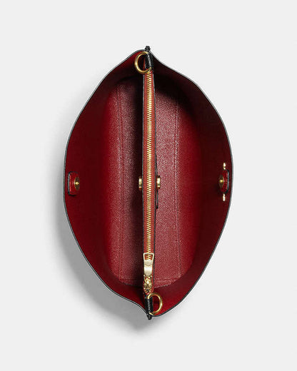 COACH MOLLIE BUCKET BAG IN SIGNATURE CANVAS