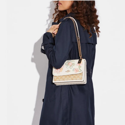 Klare Crossbody In Signature Canvas With Floral Embroidery