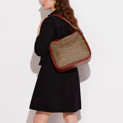 Cary Shoulder Bag In Signature Canvas